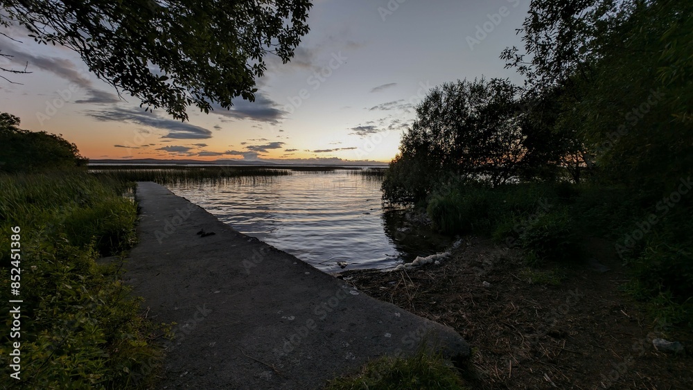 Beautiful lakeside sunset scenery, Corrib lake at Galway, Ireland