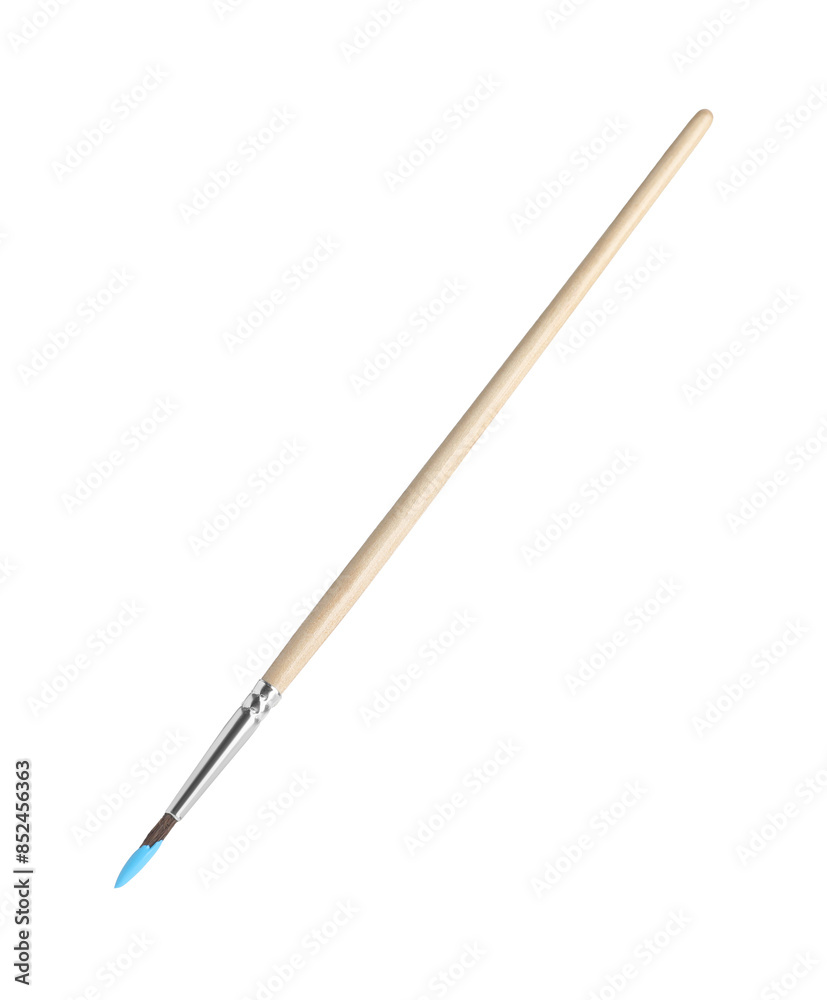 Wooden brush with light blue paint isolated on white Wooden brush with light blue paint isolated on white