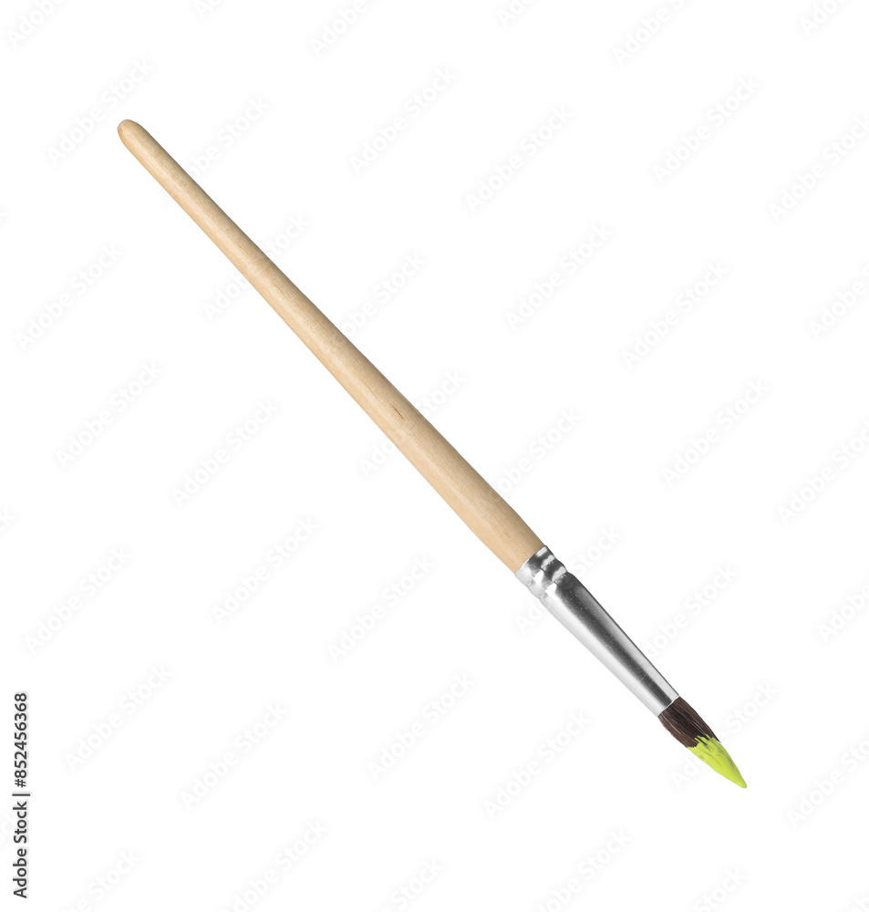 Wooden brush with light green paint isolated on white Wooden brush with light green paint isolated on white