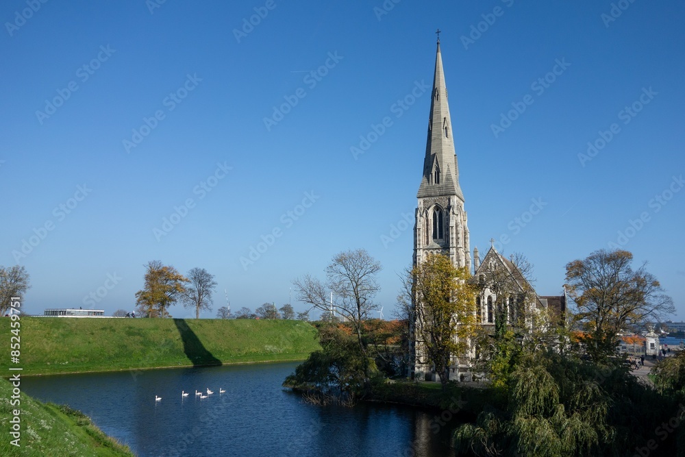 St Alban Church (Sankt Albans Kirke) in Copenhagen, Denmark, Kastelgraven lake, swans in water