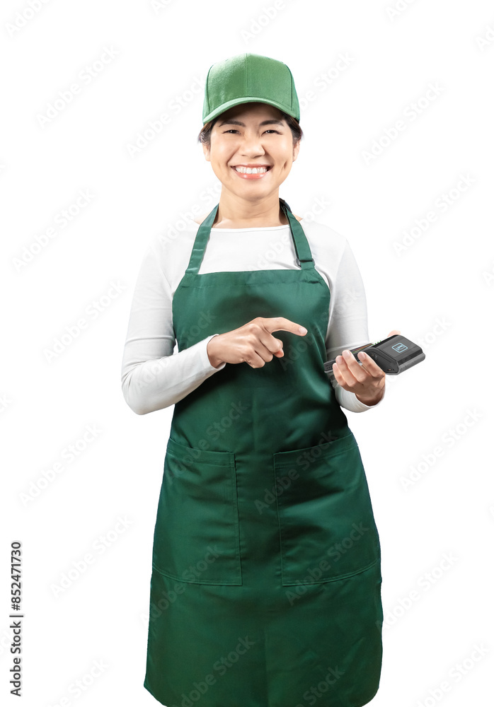 Asian seller wear green apron and green cap smiling with card reader isolated on white Asian seller wear green apron and green cap smiling with card reader isolated on white