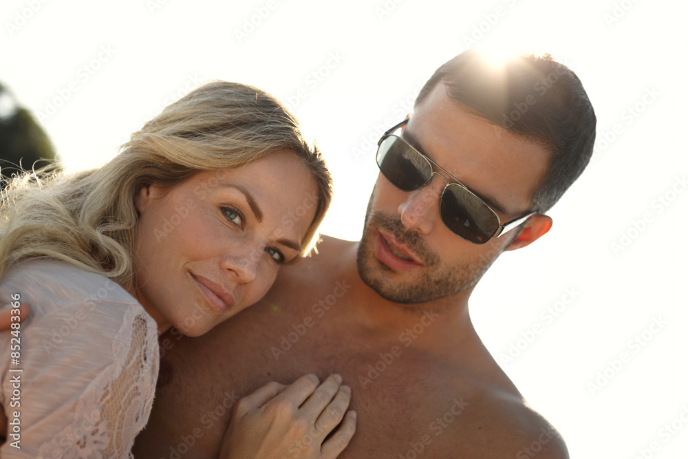Couple, beach and portrait on vacation with hug for love in relationship with travel abroad. People, holiday and embrace on getaway trip, summer and sun with support and affection outdoor on date Couple, beach and portrait on vacation with hug for love in relationship with travel abroad. People, holiday and embrace on getaway trip, summer and sun with support and affection outdoor on date