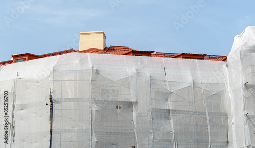 reconstruction building Covered or wrap with Mesh fabric for dus