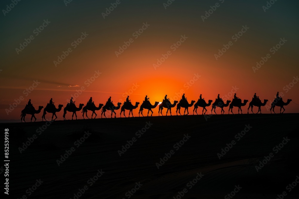 Fototapeta premium Camel Caravan at Sunset in Desert