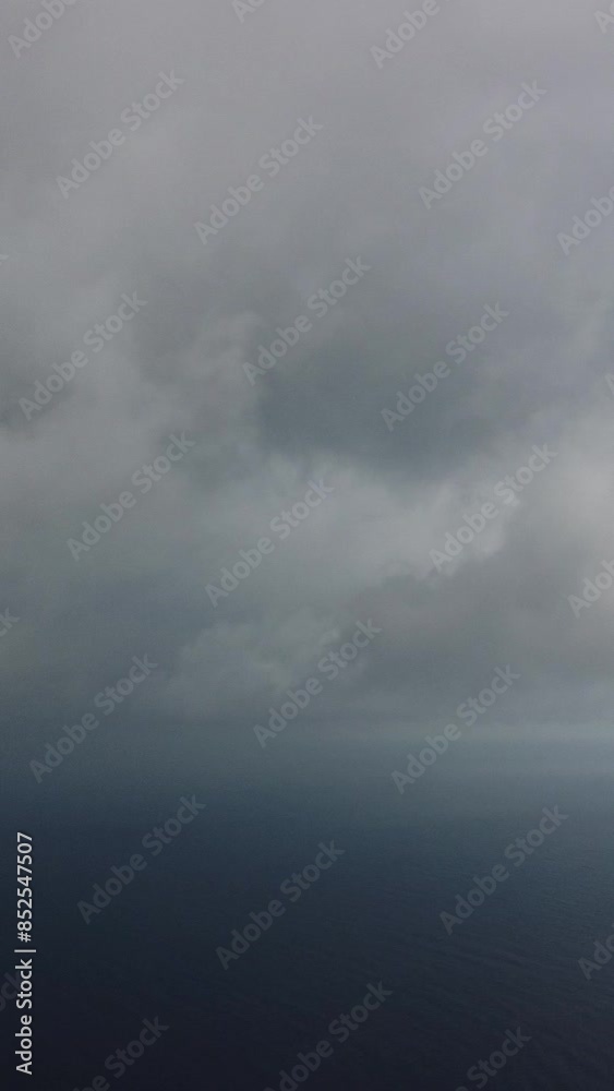 Aerial view. Blue sky sun and fog over calm sea. The drone flies over foggy and fluffy clouds. Abstract aerial nature summer ocean sunset sea and sky background. Vacation, travel and holiday concept. Aerial view. Blue sky sun and fog over calm sea. The drone flies over foggy and fluffy clouds. Abstract aerial nature summer ocean sunset sea and sky background. Vacation, travel and holiday concept.