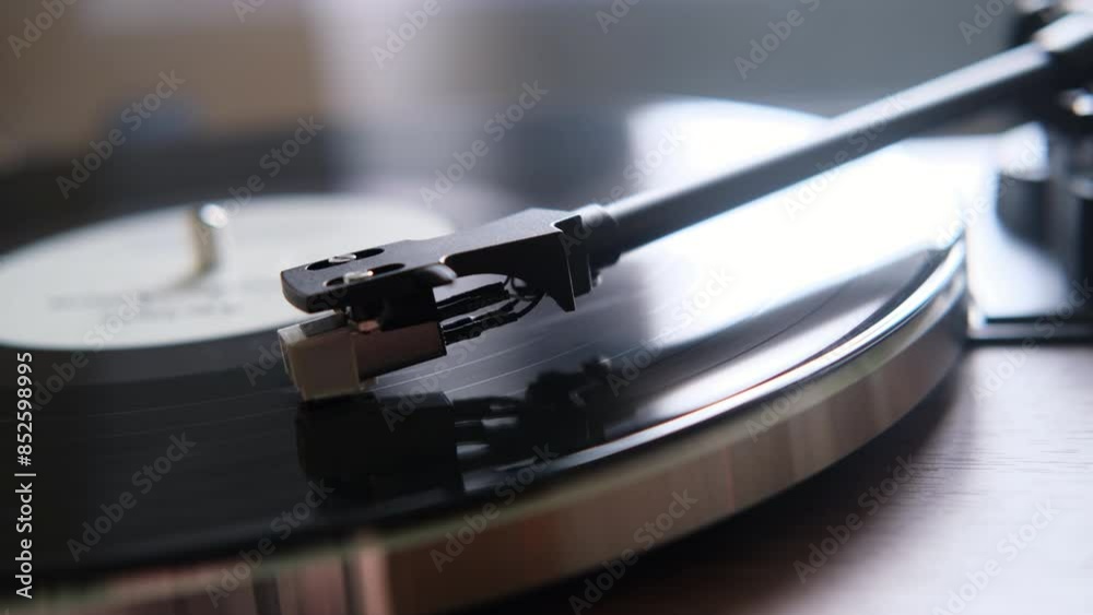 vinyl record player, music vinyl disk record spinning in the turntable. selective focus vinyl record player, music vinyl disk record spinning in the turntable. selective focus