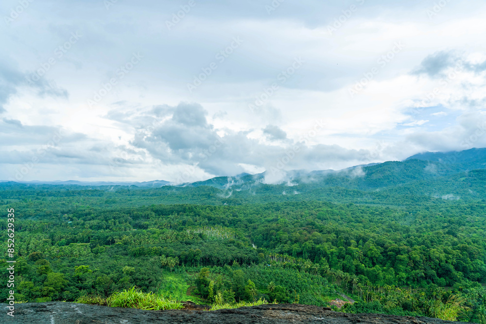 Naklejka premium mountain landscape with clouds