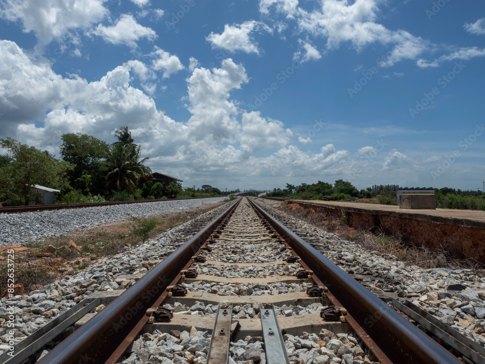 Fototapeta premium track transportation travel rail railroad railway train line journey steel way station industry speed path locomotive traffic outdoor subway transit cargo import export blue sky nature iron motion art