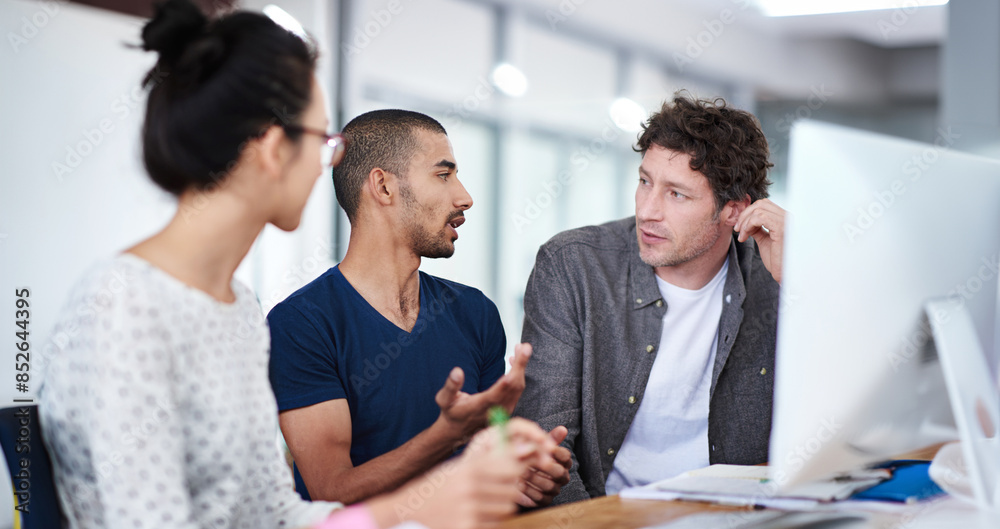 Business people, teamwork and talking in office on computer with problem solving or publishing solution. Editor, copywriter and group planning for story, manuscript or creative project development Business people, teamwork and talking in office on computer with problem solving or publishing solution. Editor, copywriter and group planning for story, manuscript or creative project development