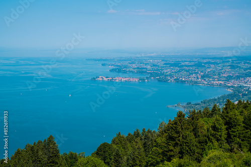 Obraz na płótnie Germany, Panorama nature landscape view above green tree rops to lindau island at lake constance bodensee in summer with blue sky w salonie