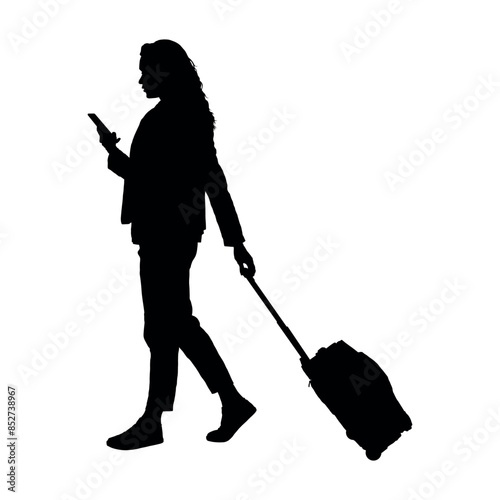 Woman looking on smarphone while pulling luggage vector silhouette. photo