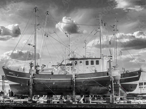 Obraz na płótnie Fishing cutter for maintenance work in the shipyard w salonie