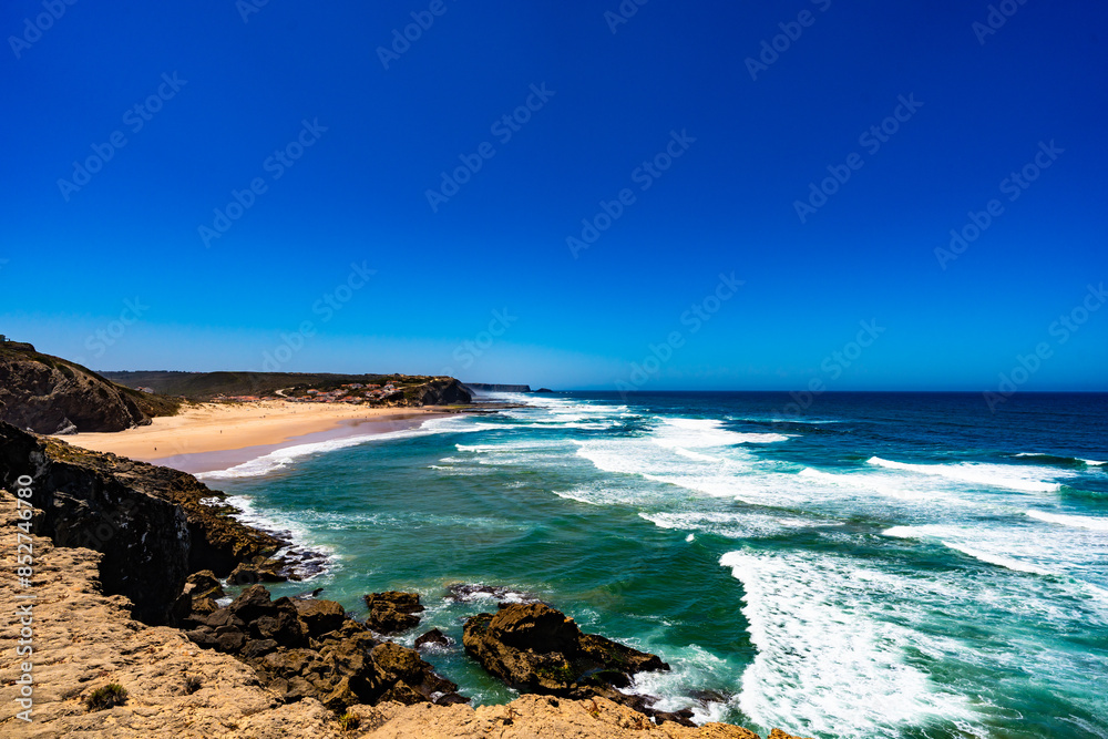 Sandy beach and blue sky Portugal, Algarve, Monte Clerigo praia
Sandy beach and blue sky Portugal, Algarve, Monte Clerigo praia