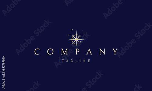 A vector golden logo featuring an abstract image a bright star against an eclipse.