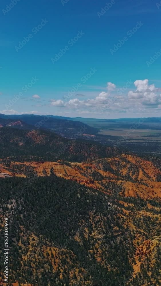 Splendid picturesque landscape of mountains covered with pine trees. Amazing blue skies over the Utah canyons in USA. Vertical video Splendid picturesque landscape of mountains covered with pine trees. Amazing blue skies over the Utah canyons in USA. Vertical video