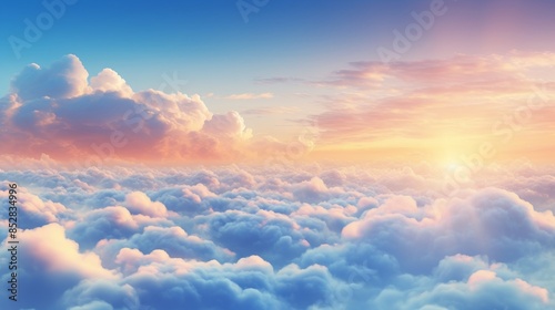 A breathtaking view of a colorful sunrise above a sea of fluffy clouds. The sky is painted with hues of pink, orange, and blue.