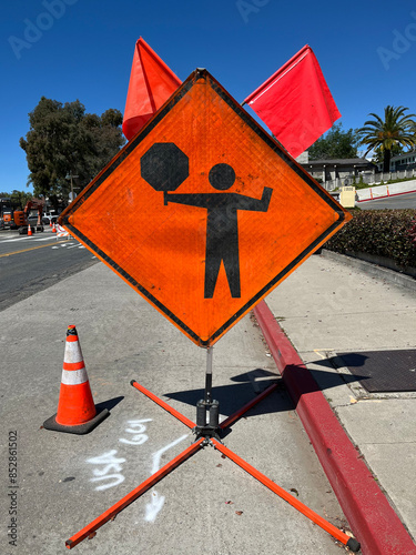 FLAGMAN AHEAD sign at road construction site