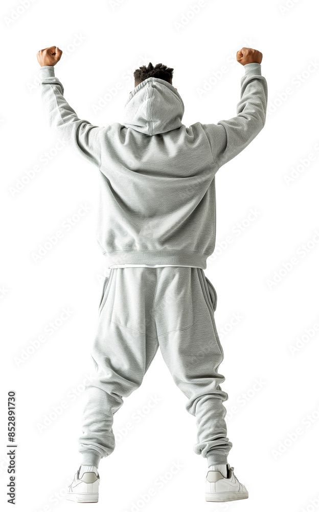 Person in a hoodie and sweatpants posing with arms raised, photographed on a white background, symbolizing victory or celebration. Generative AI Person in a hoodie and sweatpants posing with arms raised, photographed on a white background, symbolizing victory or celebration. Generative AI