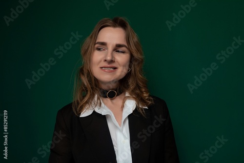 Woman Standing in Front of Green Wall