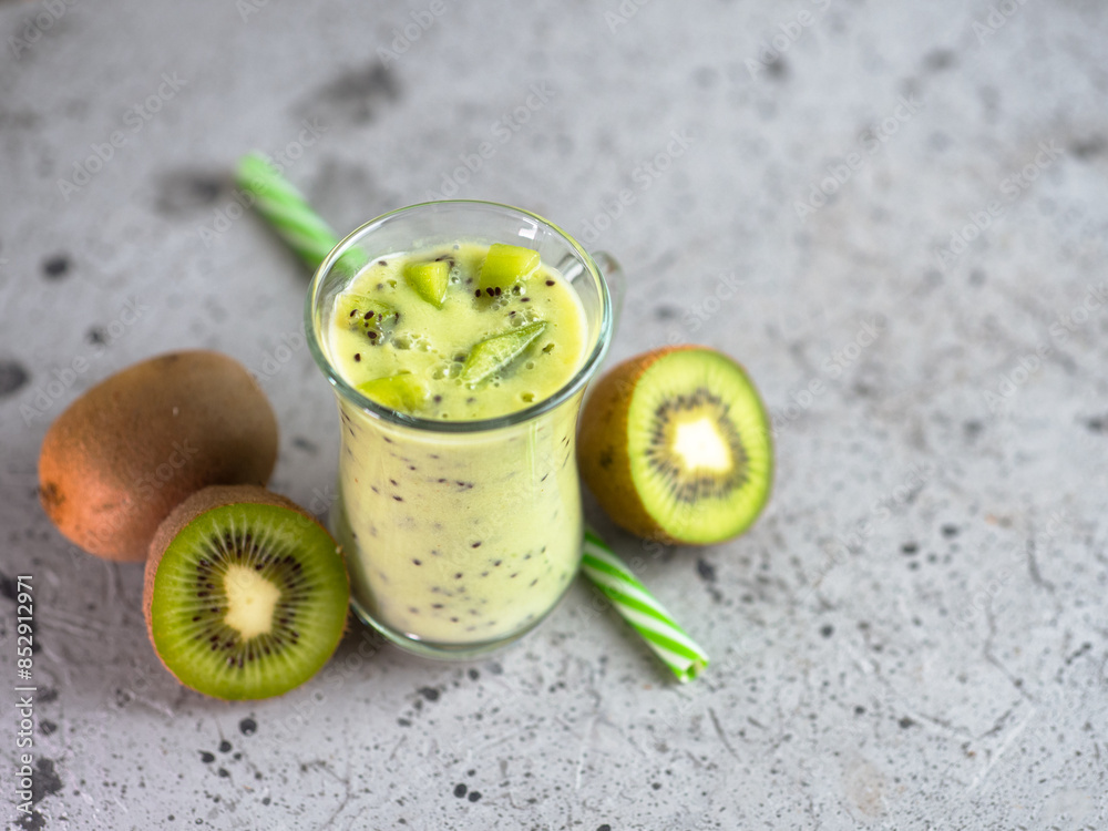 Homemade yogurt with kiwi slices on the table Homemade yogurt with kiwi slices on the table