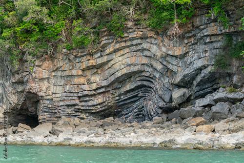 Photography Amazing hillside cliff with compressed layer rock structure or call Pancake rock in the nature geological