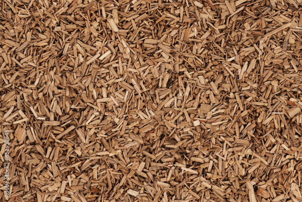 Wooden chips texture background. small wood chips for smoking. sawdust texture. ecological fue Wooden chips texture background. small wood chips for smoking. sawdust texture. ecological fue