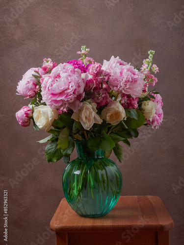 Bouquet of pink peony flowers close up. Womens day or wedding concept.