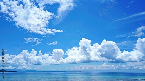 Cloudscape Over a Tranquil Sea © vanzerim