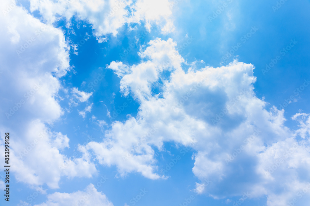 Beautiful blue sky and white fluffy group of clouds background in the morning skyline Beautiful blue sky and white fluffy group of clouds background in the morning skyline