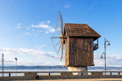The wooden windmill on the promenade before the town entrance of Old Town Nesebar, Burgas Province, Bulgarian Black Sea coast