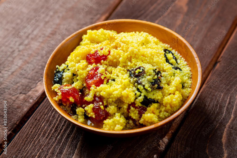 couscous stewed vegetables with meat and spices on the festive table couscous stewed vegetables with meat and spices on the festive table