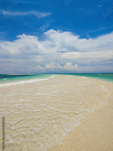 Beautiful ocean waves over the sandbar. Camiguin Island. Philippines. photo