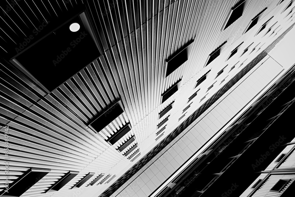 Fototapeta premium Urban background with exterior buildings facade in Munich, Germany. Black and white image.