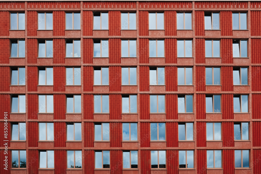 Exterior pattern facade building architecture with red stones and windows. Exterior pattern facade building architecture with red stones and windows.