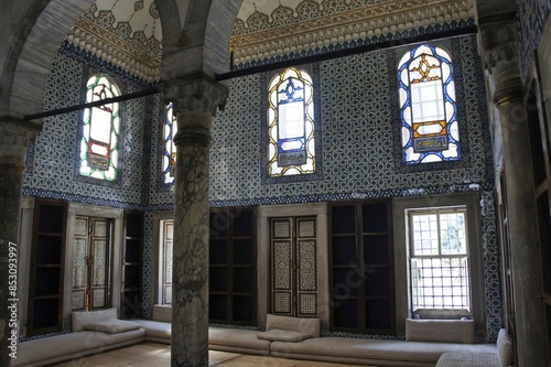 The interiors of the Ahmed II library Inside the Topkapi Palace in Istanbul is a masterpiece of Ottoman architecture it is decorated with ceramic tiles, geometric patterns and stained glass windows photo