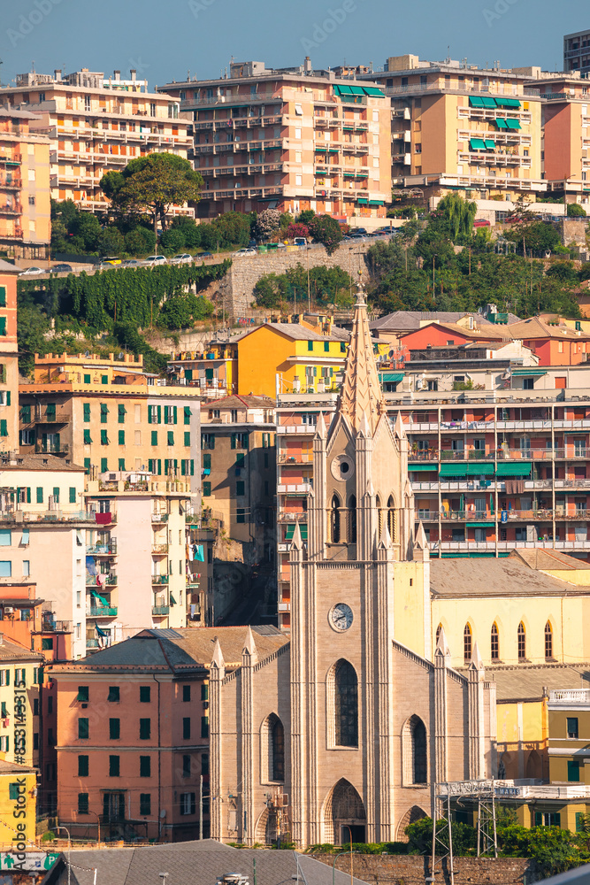 he photo showcases the bustling harbor of Genoa filled with a variety of ships. The clear blue water reflects the vibrant vessels, while the skyline features a mix of modern and traditional. he photo showcases the bustling harbor of Genoa filled with a variety of ships. The clear blue water reflects the vibrant vessels, while the skyline features a mix of modern and traditional.