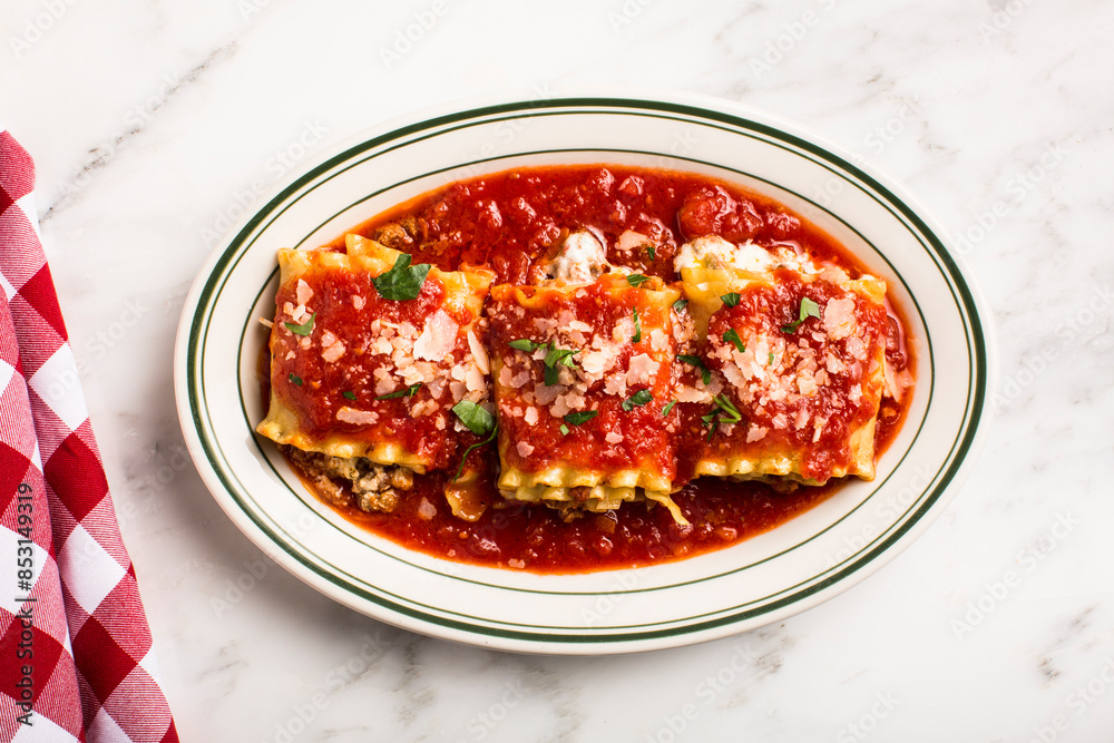 Overhead of plate of pasta on marble surface Overhead of plate of pasta on marble surface