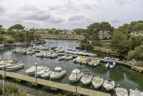 Boats Docked at Cala Busquets Marina, Menorca photo