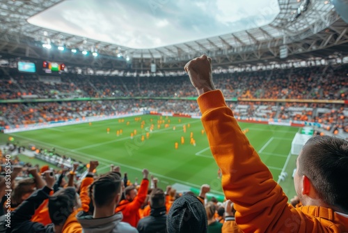 Fans Fist Pump During a Soccer Game at a Stadium Under Cloudy Skies