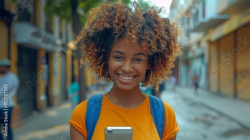 Smiling Woman With Dreadlocks Using Cell Phone