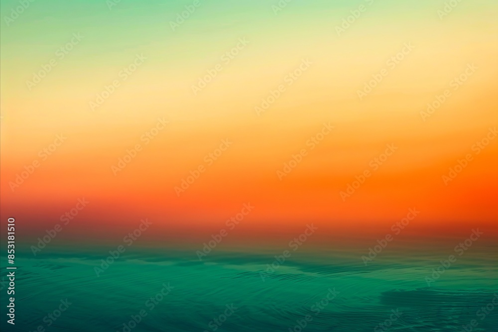 A sunset over the ocean with a blue sky. A sunset over the ocean with a blue sky.