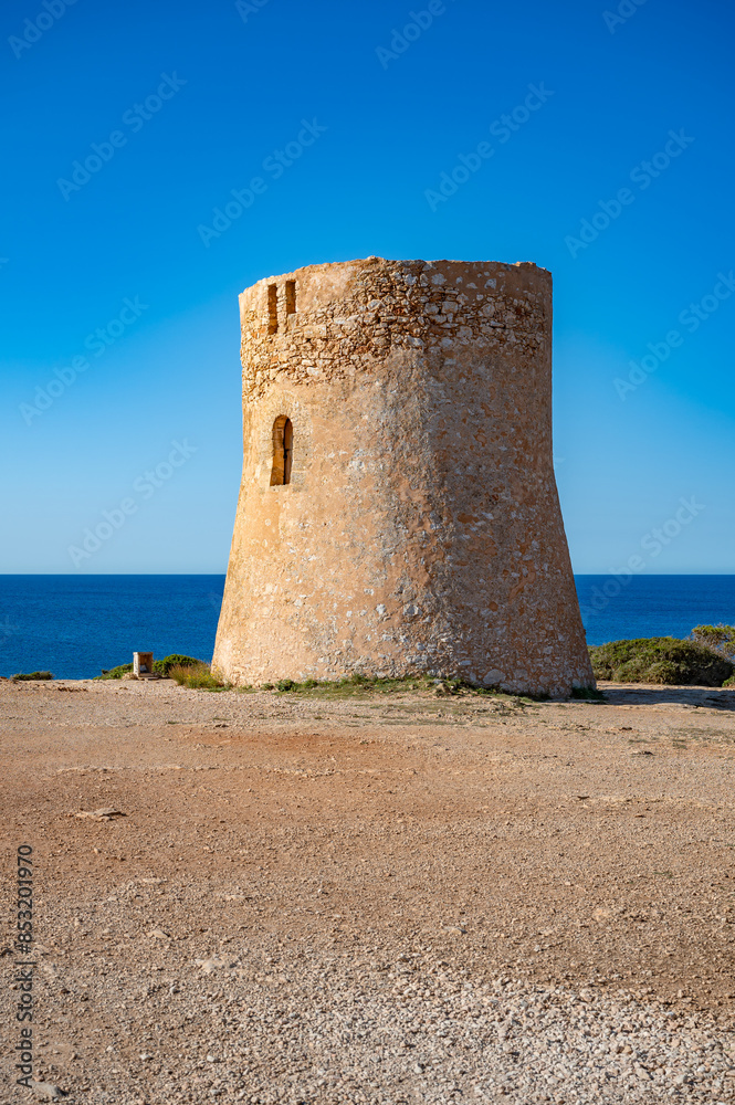 Torre de Cala Pi, Majorca with sea in the background, clear sky, vertical shot, Mallorca Torre de Cala Pi, Majorca with sea in the background, clear sky, vertical shot, Mallorca