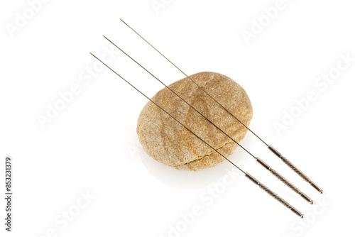 Silver needles for traditional Chinese medicine acupuncture. Close-up. Isolated white background. There is some free space for your text or sign.