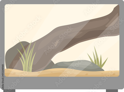 Empty terrarium with sand substrate, a tree branch, and some grass, ready for a reptile to move in