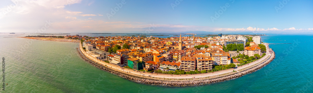 Naklejka premium City of Grado, Italy, in summer at sunset