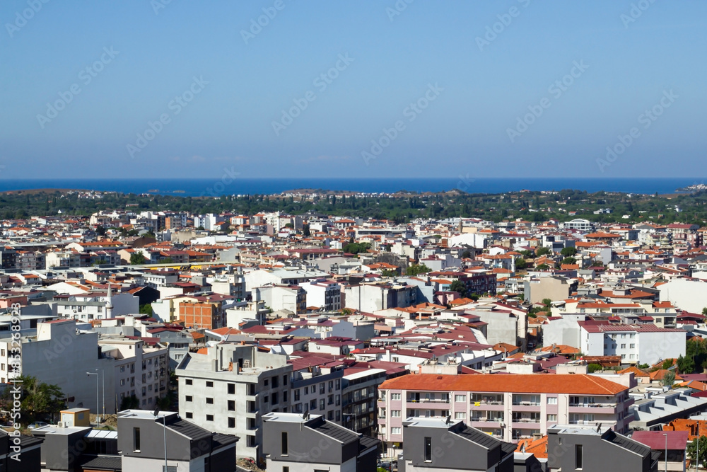 Fototapeta premium General view of Seferihisar, the cittaslow city of Izmir,Turkey. In the city, which is in an earthquake zone, concrete buildings have replaced tangerine gardens.