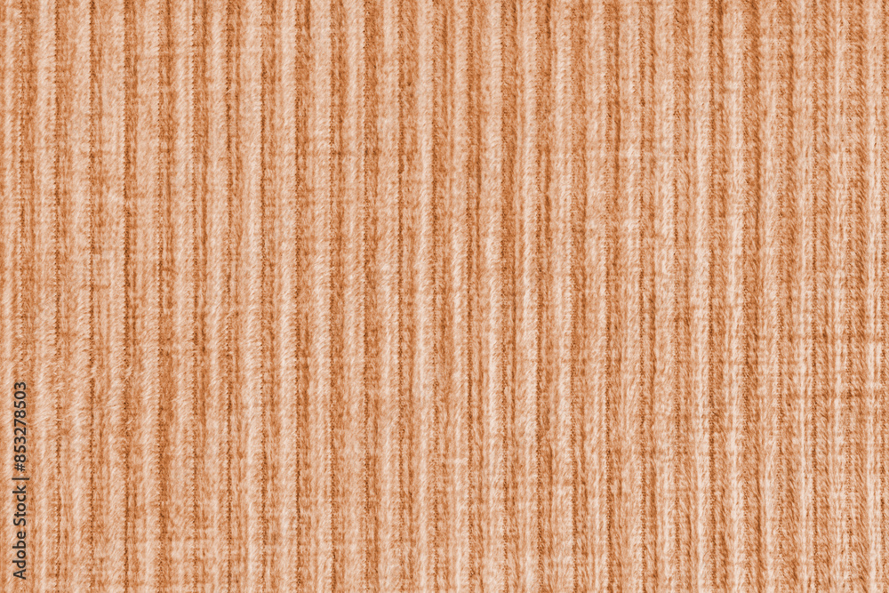 Ridge texture background of velour corduroy orange cloth. Large ribbed, coarse weaving fabric Ridge texture background of velour corduroy orange cloth. Large ribbed, coarse weaving fabric