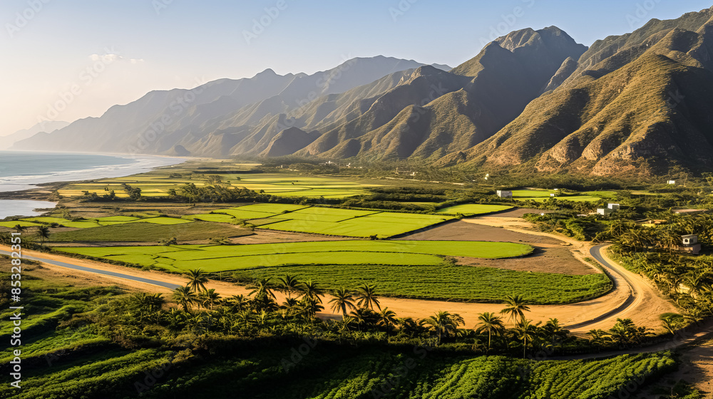 Obraz premium A beautiful landscape with mountains and a beach