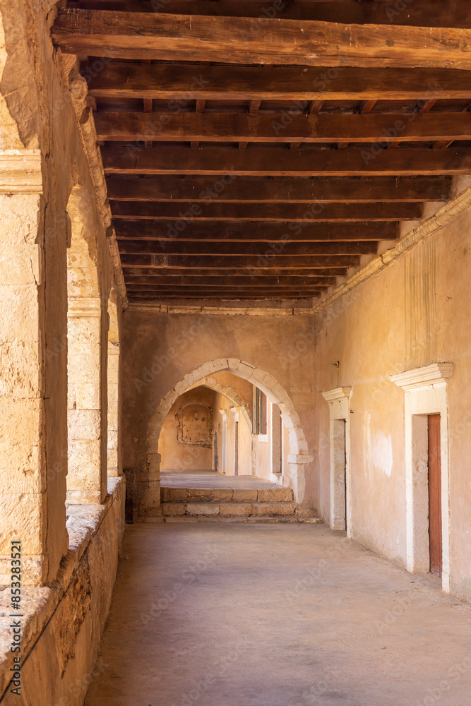 Europe, Greece, Crete, Rethymno. Venetian Baroque, 16th C. Eastern Orthodox Monastery. The Holy Monastery of Arkadi. Arched stone passageway. Europe, Greece, Crete, Rethymno. Venetian Baroque, 16th C. Eastern Orthodox Monastery. The Holy Monastery of Arkadi. Arched stone passageway.
