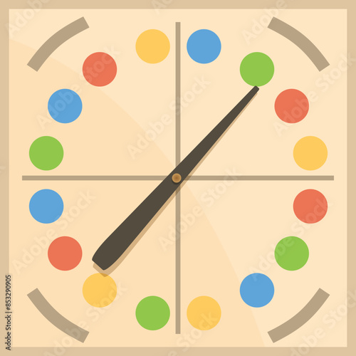 Board game spinner pointing on a green dot, indicating the next move in a game of chance and strategy